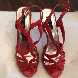 White House black market orange-red strapped heel.